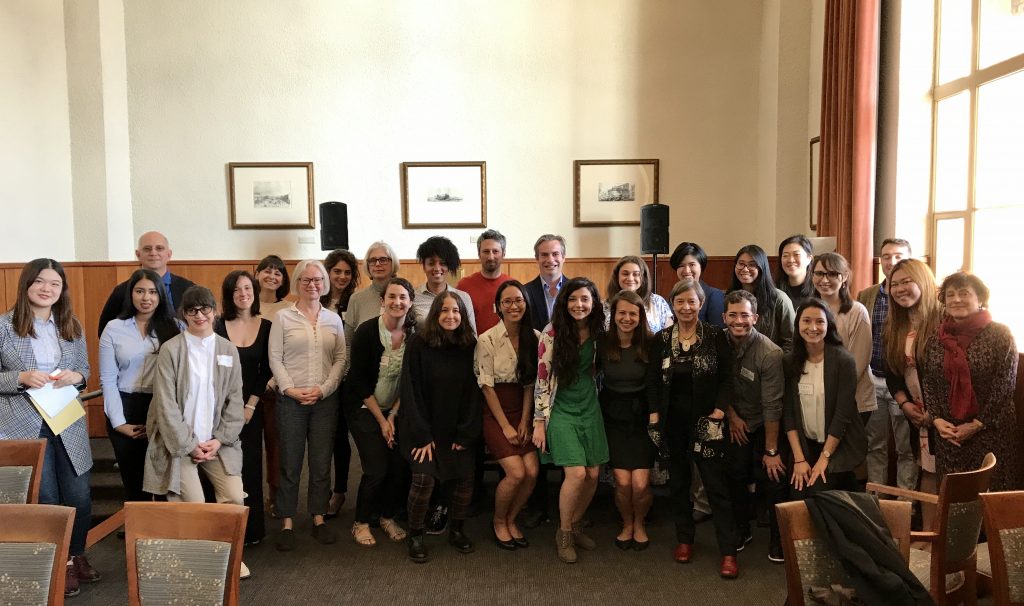 Group photo of the members of the Working Group in Memory Studies inside Royce Hall. 
